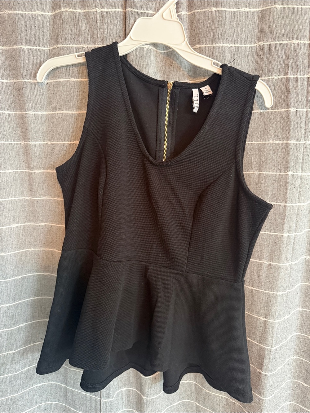 Elle Black Peplum Shell with Gold Back Zip